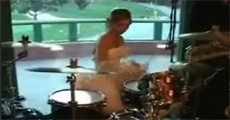 Bride Rocks Out on the Drums